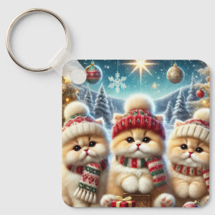 Porte-clés Chats Kitty dans un décor festif de Noël et neige