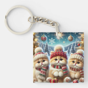 Porte-clés Chats Kitty dans un décor festif de Noël et neige