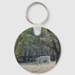 Porte-clés Cheval blanc dans les arbres