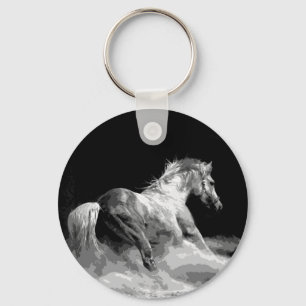 Porte-clés Cheval noir et blanc en action