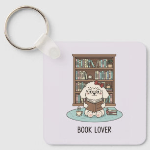 Porte-clés Chien Poodle Amoureux de Livres au Pastel Chauffe-