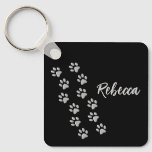 Porte-clés Clé de Motif d'impression noire des pattes de chie