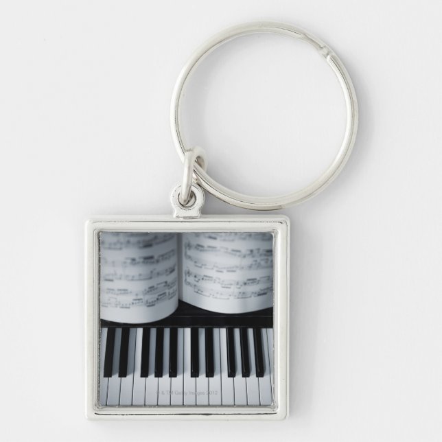 Porte-clés Clés de piano et cahier de musique (Devant)