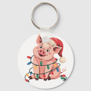 Porte-clés Cochon aux lumières de Noël portant un chapeau de
