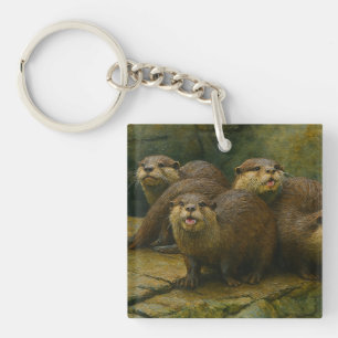 Porte-clés Compagnie curieuse - Famille Otter sur les rochers