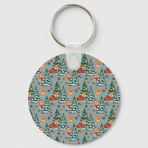 Porte-clés Corgis décorent l'arbre de Noël en forêt