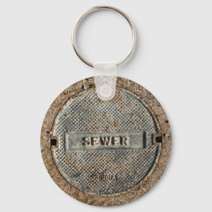 Porte-clés Couverture de trou d'homme d'égout