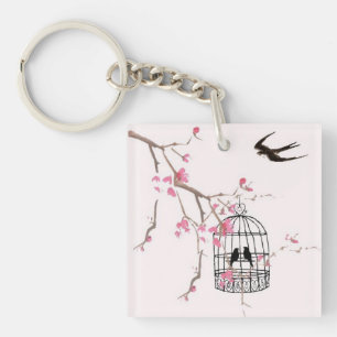 Porte-clés de cage à oiseaux de fleurs de cerisi
