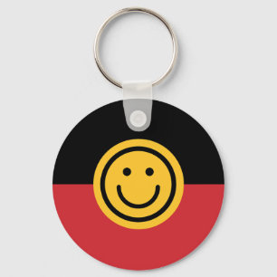 Porte-clés Drapeau aborigène australien avec visage sourire