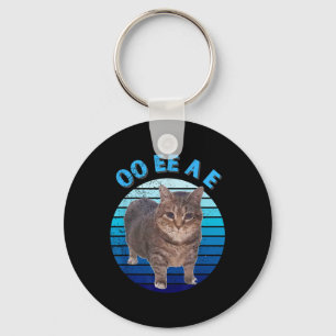 Porte-clés Drôle Oiia Distressed Chat Frottant Chat Oi Oi Uia
