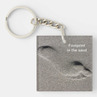 Porte-clés Empreinte de pas dans le porte - clé de sable