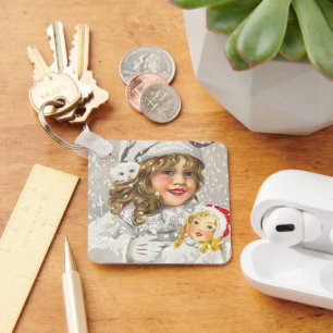 Porte-clés Fille victorienne de Noël vintage avec poupée dans