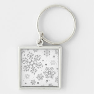 Porte-clés Flammes de neige en argent sur blanc