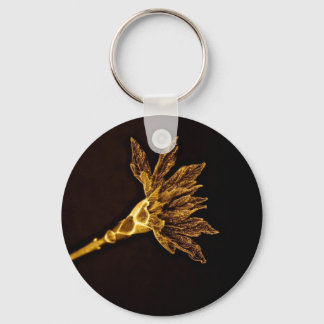 PORTE-CLÉS FLEUR D'OR ABSTRAITE SUR FOND NOIR