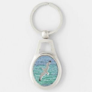 Porte-clés Goéland volant au-dessus de la mer