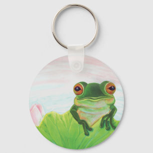 Porte-clés Grenouille verte derrière le porte - clé du tapis