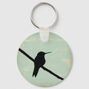 Porte-clés Hummingbird Silhouette on Blue Grunge Background