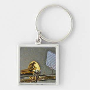 Porte-clés Instrument de musique de trombone avec la notation