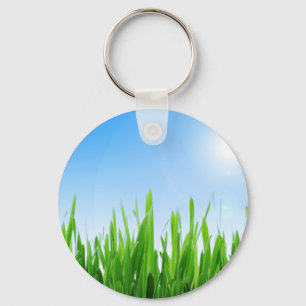 Porte-clés Jardin à l'herbe verte avec conception de ciel ble