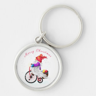 Porte-clés Joyeux Noël - Gnome drôle avec vélo et cadeaux