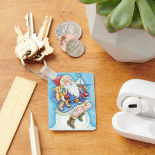 Porte-clés Joyeux Noël, Père Noël sur un boule de neige avec 