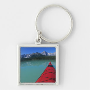 Porte-clés Kayak sur le lac de la sauvagine au-dessous du pic