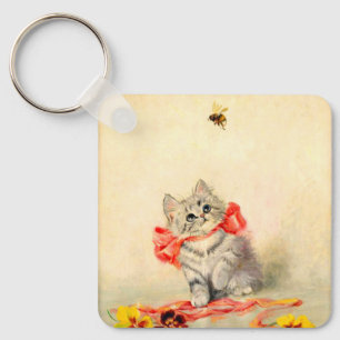 Porte-clés Kitten avec ruban rouge