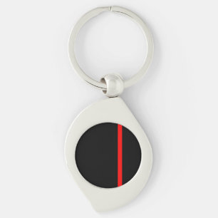 Porte-clés La ligne rouge mince symbolique dans un décor noir