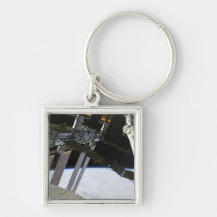 Porte-clés Le bras de l'effort parmi la stat internationale