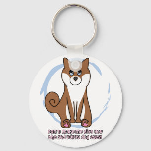 Porte-clés Le chien triste observe le porte - clé de Shiba