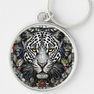 Porte-clés Léopard noir et blanc entouré de fleurs