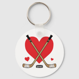 Porte-clés Les filles aiment les bâtons de hockey de coeur po