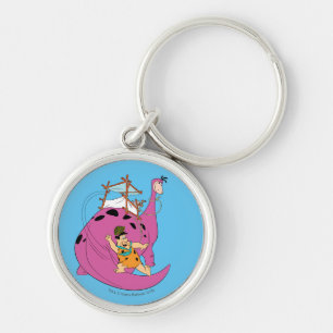 Porte-clés Les Flintstones   Fred glissant en bas de la queue