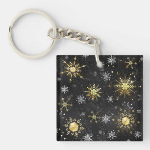 Porte-clés Les flocons dorés de Noël sur l'Arrière - plan noi