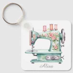 Porte-clés machine à coudre fleur bleue 