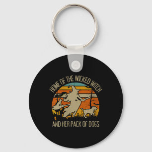Porte-clés Maison de la sorcière méchante et meute de chiens