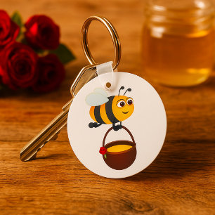 Porte-clés Mignonne Bee transportant un pot de miel avec fleu