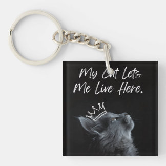 Porte-clés Mon chat me laisse vivre ici
