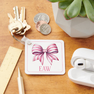 Porte-clés Monogramme à nœud papillon aquarelle rose et blanc