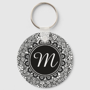 Porte-clés Monogramme de motif de fleur noir et blanc dessiné