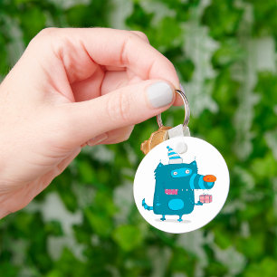 Porte-clés Monstre de dessin animé bleu joueur avec chapeau d