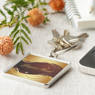 Porte-clés Motif de Noël doré avec arrière - plan rouge...