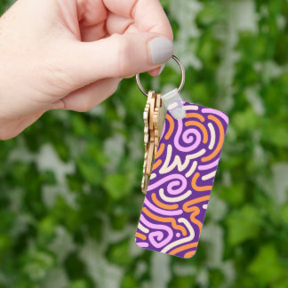 Porte-clés Motif de ruban tourbillonnant violet et rose arden