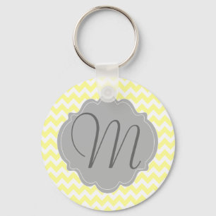 Porte-clés Motif jaune-clair et gris décoré d'un monogramme