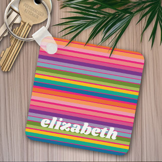 Porte-clés Motif rayé rose et coloré avec un nom funky