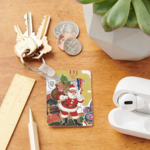 Porte-clés Noël vintage, joyeux Père Noël avec des cadeaux