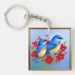 Porte-clés Oiseaux bleus colorés perchés parmi les fleurs rou