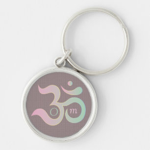 Porte-clés Om symbole en sanskrit pastel rose vert mauve
