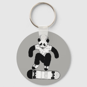 Porte-clés Panda faisant de la planche à roulettes