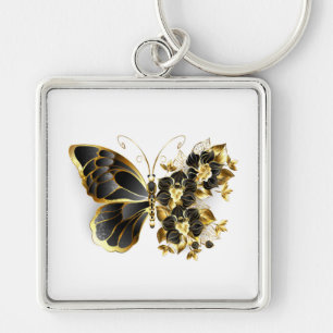 Porte-clés Papillon à fleurs d'or avec orchidée noire